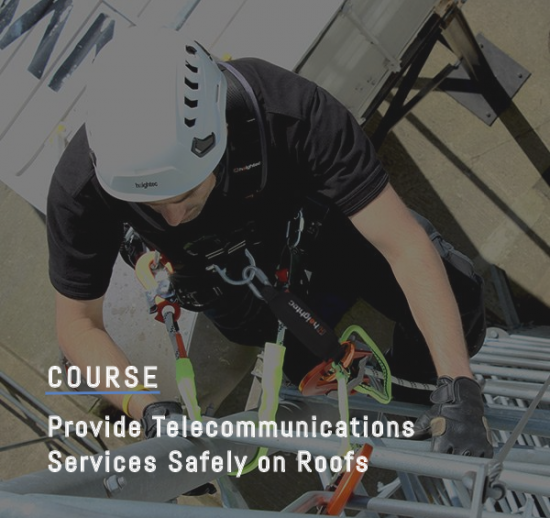 man providing telecommunications services safely on roof